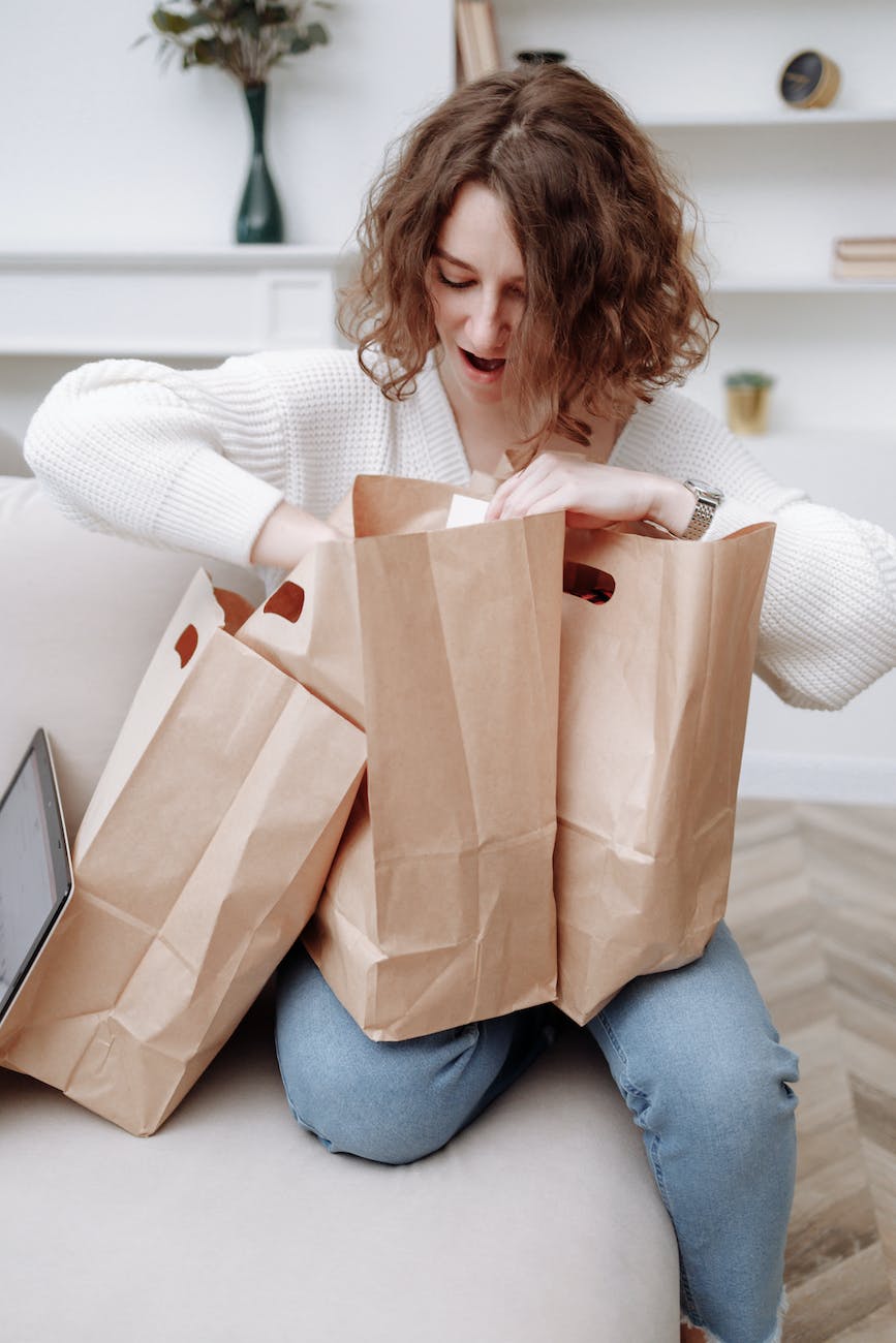 woman with three paper bags